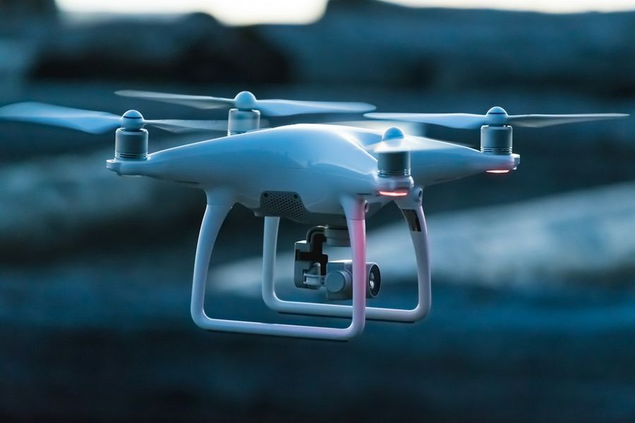 A camera drone in flight